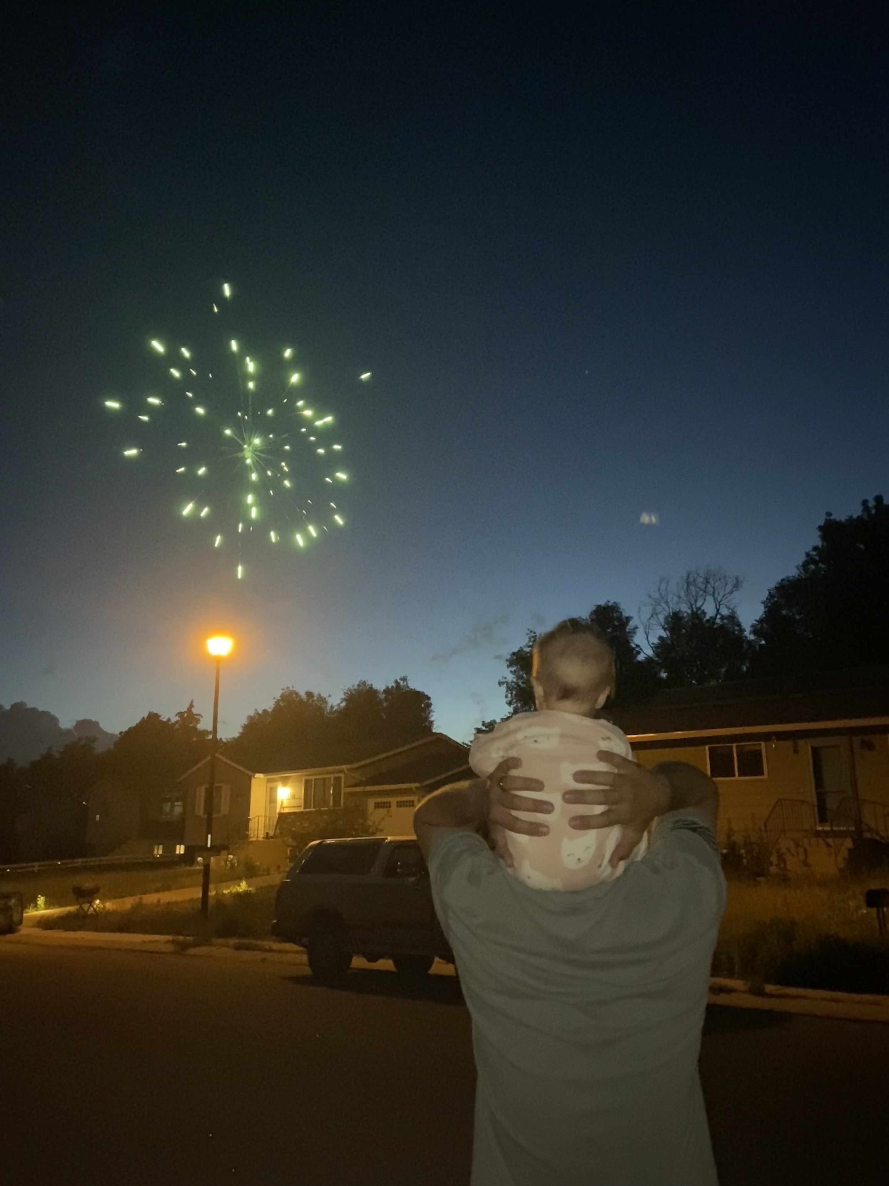 Daniel of B.S. Electric with his daughter watching fireworks